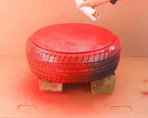 spray painting a tire