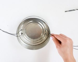 inserting wire into a tin can