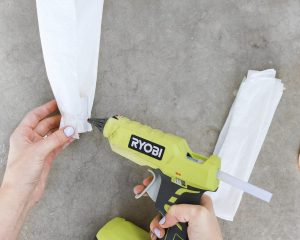 hot gluing plastic to a dowel